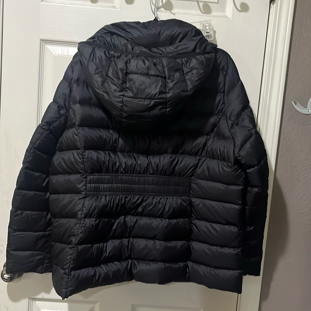 Black down feather winter jacket.